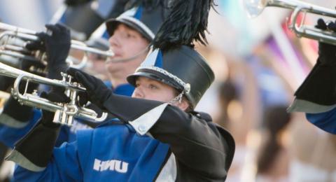 UNH Band members playing during game